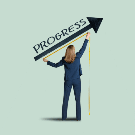 A woman in a business suit stands holding a measuring tape, reaching up to touch an upward-pointing arrow labeled "PROGRESS," symbolizing the importance of Setting Mini Goals on a light green background. Austin Marathon Half Marathon & 5K