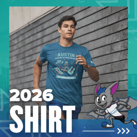 A young man runs outdoors wearing a blue 2026 Austin Marathon shirt from the Austin Marathon expo 2026. The shirt features a city skyline, guitar, and mascot bat, with bold text marking the 35th anniversary’s "2026 SHIRT. Austin Marathon Half Marathon & 5K
