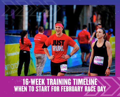 Smiling runners at marathon event wearing bibs