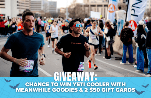 Runners in a city marathon pass spectators; giveaway text at bottom offers a chance to win a Yeti cooler, Meanwhile goodies, two $50 gift cards, and exclusive film passes to the Paramount Theatre. Austin Marathon Half Marathon & 5K