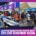 People browse rows of tables with hanging size signs at an Austin Marathon expo, an information session for runners before they reach the finish lines. Austin Marathon Half Marathon & 5K