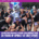 A group of marathon runners in Team SPIbelt shirts pose for a photo with an Austin Marathon mascot while wearing race medals. Text overlay reads: “Austin Marathon celebrates 20 years of SPIbelt at 2027 event.” Austin Marathon Half Marathon & 5K